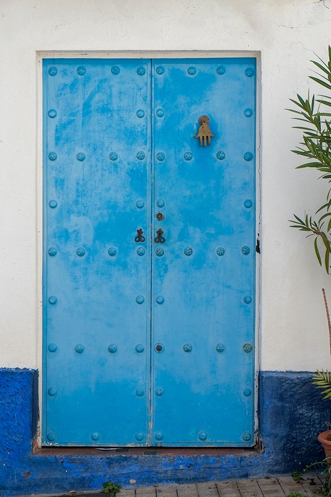 Marbella, Spain. Colorful Spanish architecture. Blue door.